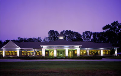 Night view of the exterior of East Baton Rouge Parish Library Baker branch. Designed by Cockfield Jackson Architects. 