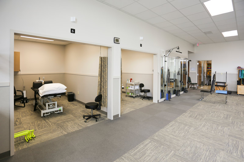 Interior image of Baton Rouge Physical Therapy Lake in Prairieville, LA. Designed by Cockfield Jackson Architects.