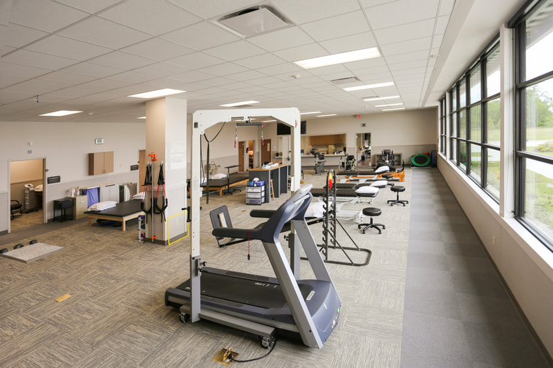 Interior image of Baton Rouge Physical Therapy Lake in Prairieville, LA. Designed by Cockfield Jackson Architects.