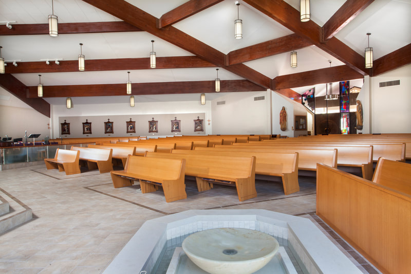 Interior image of Holy Family Catholic Church in Port Allen, LA. Renovations by Cockfield Jackson Architects.