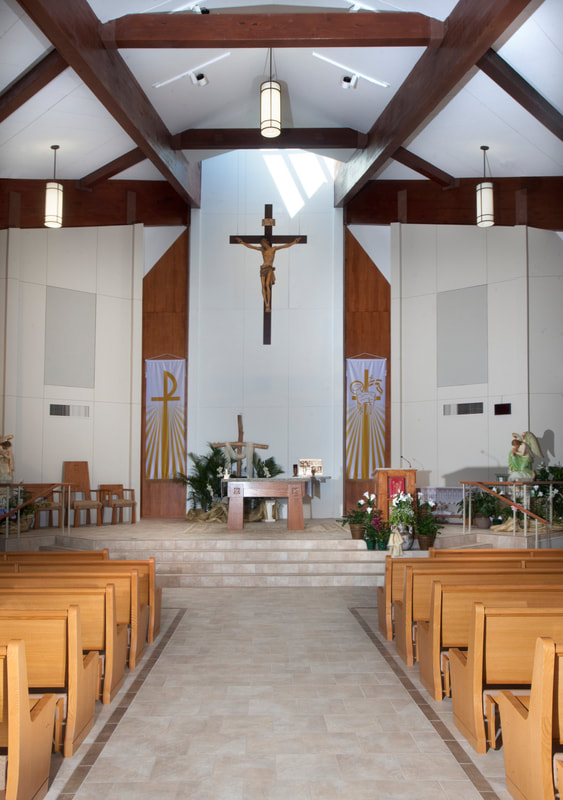 Interior image of Holy Family Catholic Church in Port Allen, LA. Renovations by Cockfield Jackson Architects.