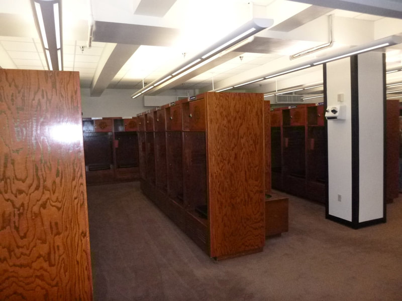 Interior image of LSU Tiger Stadium locker room prior to renovations completed by Cockfield Jackson Architects.
