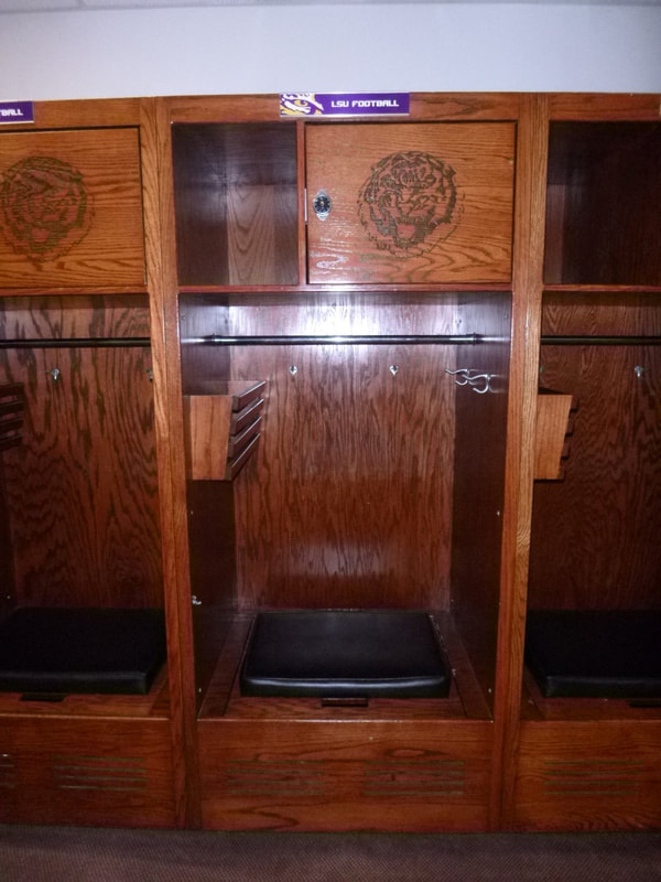 Interior image of LSU Tiger Stadium locker room prior to renovations completed by Cockfield Jackson Architects.